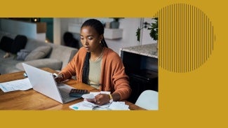 Woman working at her desktop