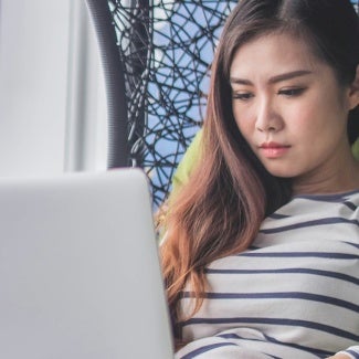 Woman working on laptop