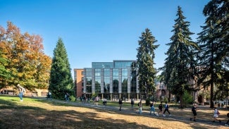 Exterior of Founders Hall, Foster School of Business on a sunny day.