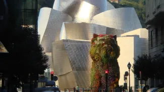 Exterior of Guggenheim Museum Bilbao on a sunny day.