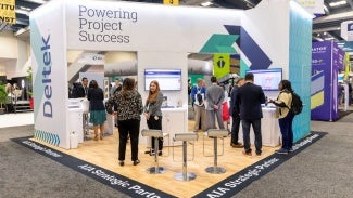 AIA Conference on Architecture & Design Expo floor showing Deltek booth