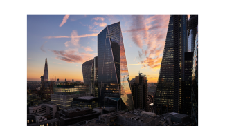 London's financial district skyline at sunset.