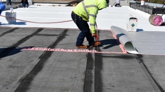 Installation of a hybrid roof assembly