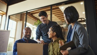 A group of diverse coworkers in an office setting