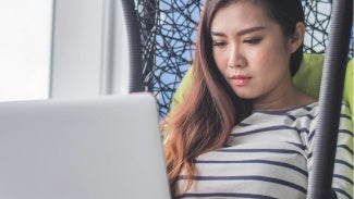 Woman working on laptop