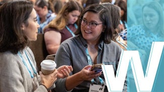 Women's Leadership Summit attendees smiling and drinking coffee