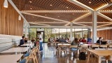  Access to daylight and natural ventilation through the project reinforces its connection to the outdoors and the experience of the changing diurnal and seasonal conditions. The shared dining hall wraps around an open courtyard bringing natural light into the space