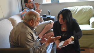 Rania working with a Syrian refugee in Seattle to assist with his family’s resettlement. 