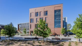 The new Natural Sciences Building and site design represents a focus on the concept of connectivity at various scales, addressing aspects of campus, materiality, curriculum and equitable access. The building’s exterior design bridges the architectural expression of the historic brick campus core and the surrounding contemporary feel of the mid-century structures.