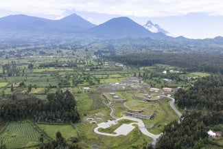 The building footprints integrated seamlessly into the landscape topography, encouraging a natural flow from interior spaces to the exterior through a series of covered patios  and connected path networks, all taking advantage of the surrounding volcanoes.