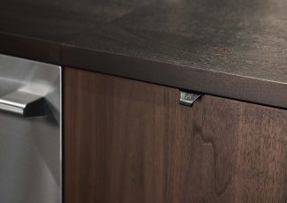 Closeup of recycled leather drawer pulls in The Professional Kitchen
