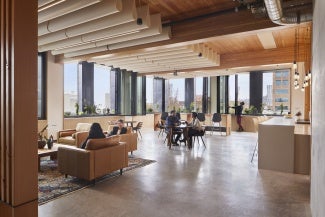 The top floor Deckony is the building’s social heart, combining the benefits of the view one would get from a rooftop deck with the added water protection of a balcony for year-round community use. 