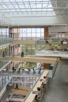 The BSE increased enrollment from 3,000 to 7,500 students with a focus on supporting economic growth and STEM-specialized workforce needs. The design includes a central atrium, tiered classrooms, and glass enclosed labs that promote the idea of “science on display.”