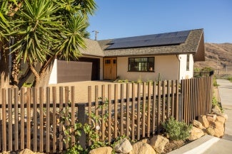 Exterior of straw bale house designed by architect Dylan Johnson