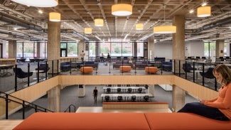 View of the Main Library interior showcasing the stair insertion connecting multiple floors.