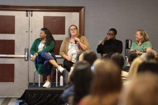 Julia Oderda, AIA, speaks during AIA's 2024 Women's Leadership Summit.