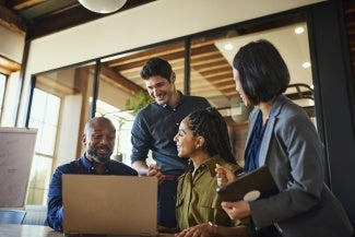 A group of diverse coworkers in an office setting