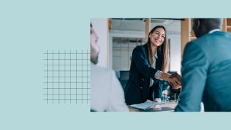 Job candidate shaking hands with hiring managers