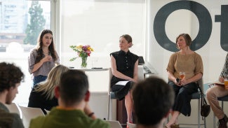 Savannah Sinowitz speaks at a panel