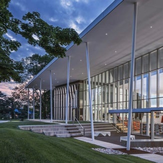 Exterior of Louisville Free Public Library Northeast Regional Public Library at sunset.