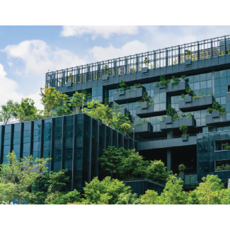 Green building with vegetation on stepped terraces