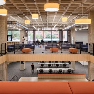 View of the Main Library interior showcasing the stair insertion connecting multiple floors.