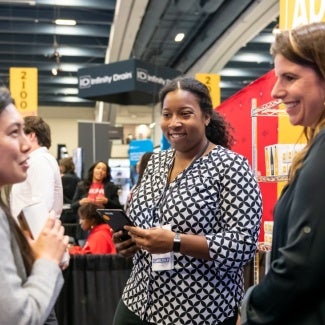 AIA members networking at conference on architecture and design