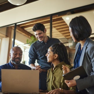 A group of diverse coworkers in an office setting