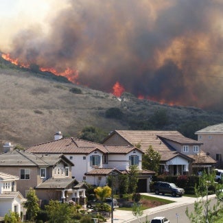 california wildfires above residential street